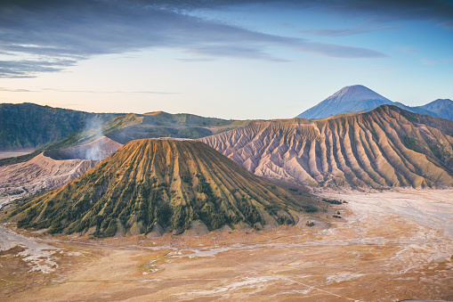 Gunung Bromo, Indonesia - July 24, 2017: Early morning at Mt Bromo, Java Island, Indonesia. Many people make their way up to the edge of the caldra of this active volcano. Locals are present with horses offering rides and 4wd off-road for tourist