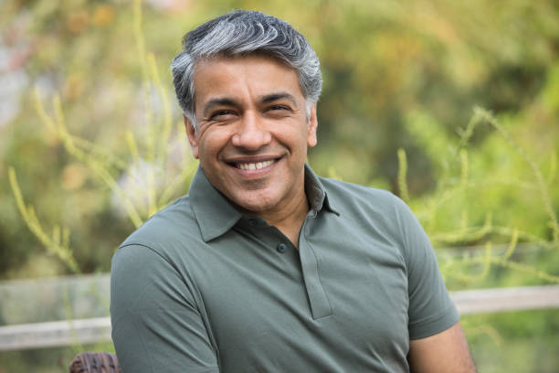 istock Portrait of happy man looking at camera 1311746974
