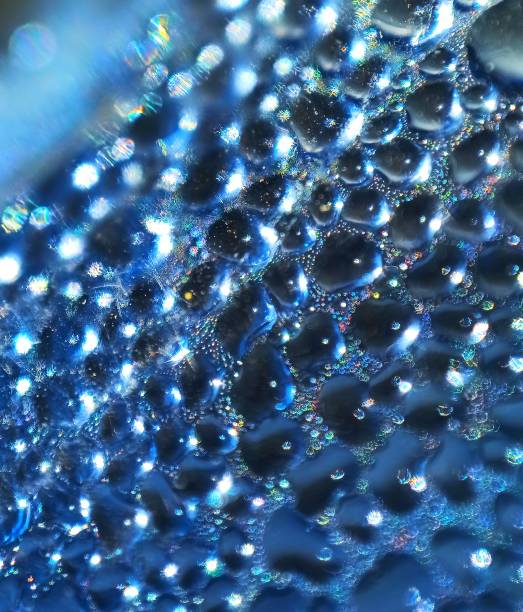 istock blue water drops close-up, abstract bokeh,light effect blue bokeh, 1311748174
