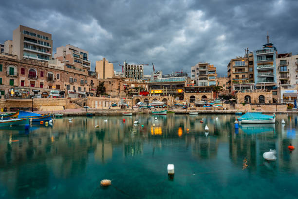 St. Julian's, Malta - January 11, 2019: Dawn over the St. Julian's town on Malta. This is very popular tourist destination on Malta.