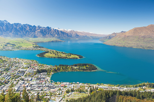 Blue lake and sky in residence housing business area in queenstown new zealand expensive area in south island