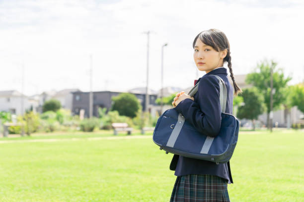 istock Asian female high school student commuting to school. 1311753352