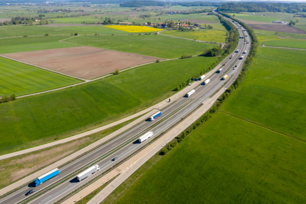 istock Truck Traffic on Highway, Aerial View 1311755789