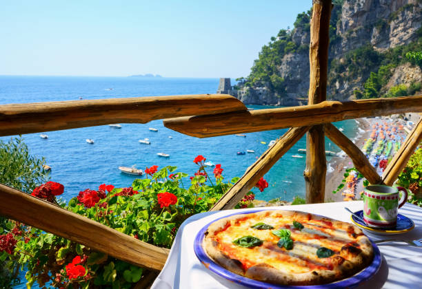 istock Pizza place overlooking to beautiful Positano coast 1311760583