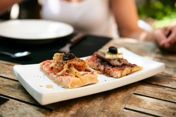 istock Spanish tapas on small plates close-up 1311765392