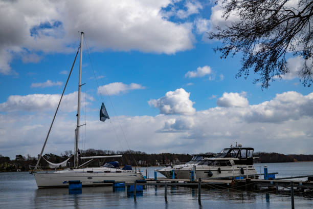 istock Two boats are moored at the pier 1311766393