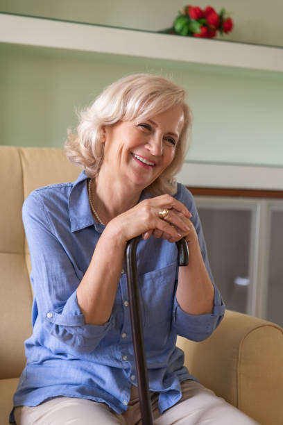 istock Senior Woman is Sitting at Home in Deep Thoughts. 1311768033