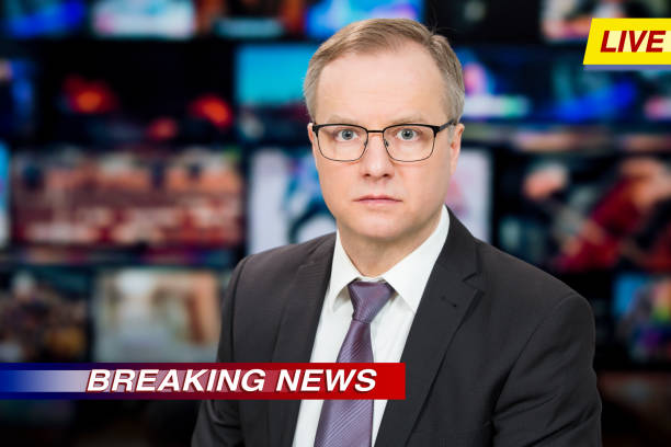 istock An anchorman reporting live breaking news 1311769157
