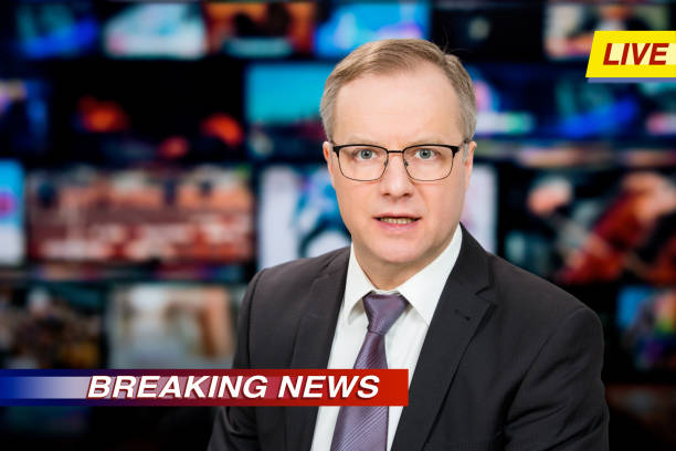 istock An anchorman reporting live breaking news 1311769196