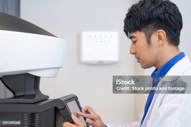 Scripted Optometry Selective Focus At Optometry Frame Equipment While Doctor Using ...