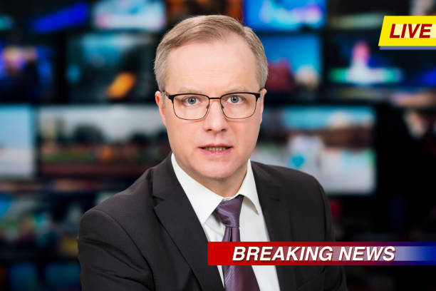 istock An anchorman reporting live breaking news 1311769877