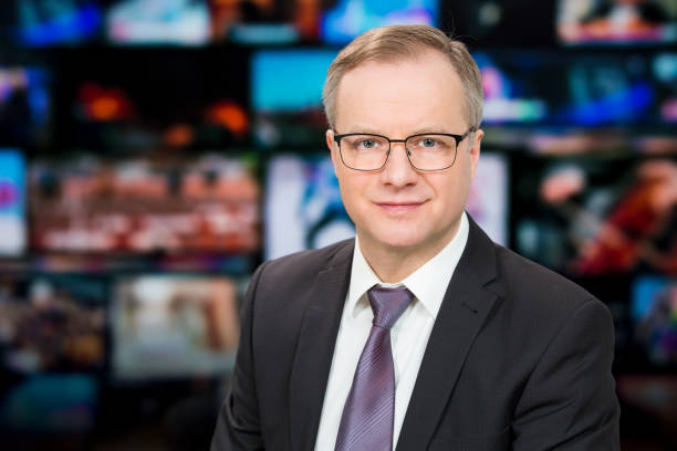 istock An anchorman reporting live breaking news 1311769927