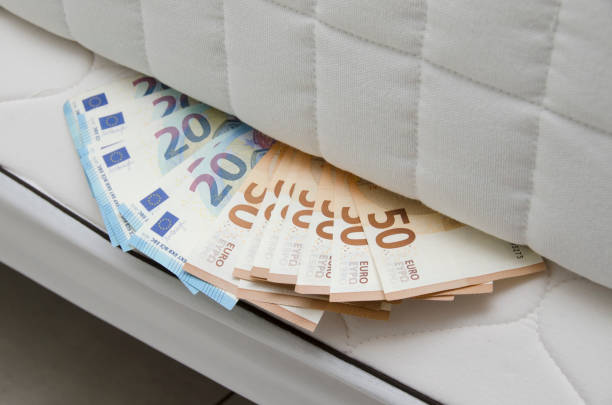 istock cash hidden under the mattress 1311772503