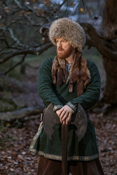 istock Russian viking warrior king in a forest 1311774388