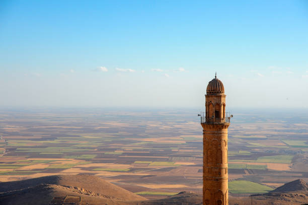 The minaret of Ulu(Great)Mosque and the plain of Mesopotamia,Mardin,Turkey The minaret of Ulu(Great) Mosque and the plain of Mesopotamia,Mardin,Turkey grand mosque photos stock pictures, royalty-free photos & images