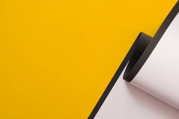istock Yellow and white abstract background divided with black stripe 1311782288