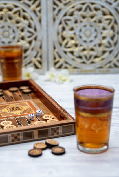 istock Oldest known board games Backgammon with cups of tee. 1311782431