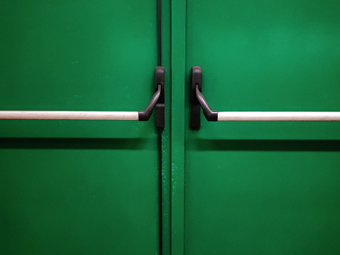 green wooden doors
