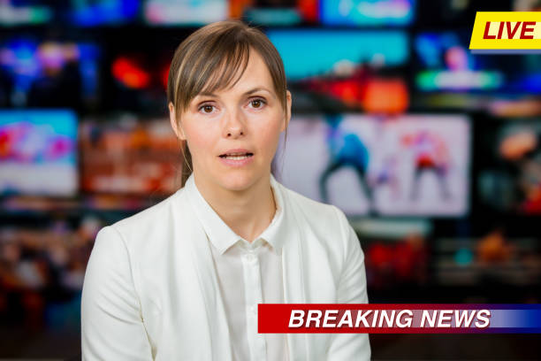 istock An anchorwoman reporting live breaking news 1311784964