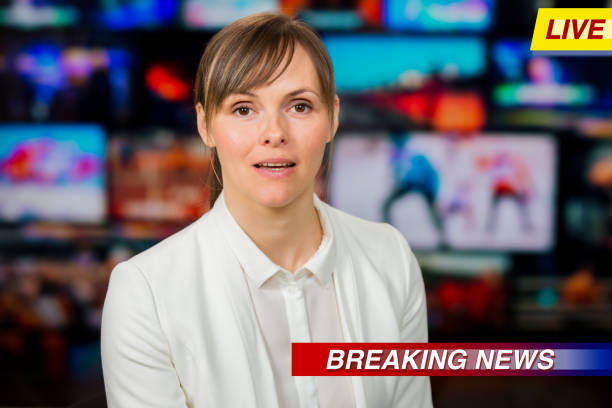 istock An anchorwoman reporting live breaking news 1311784965