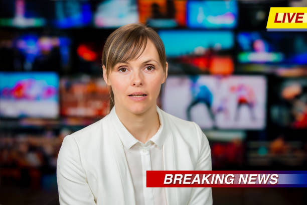 istock An anchorwoman reporting live breaking news 1311785542