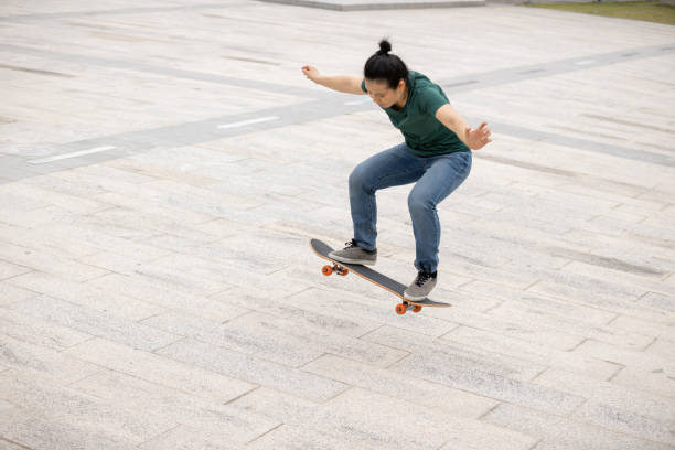 istock Skateboarder skateboarding outdoors in the morning 1311785995