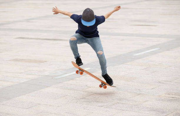 istock Skateboarder skateboarding outdoors in the morning 1311786001