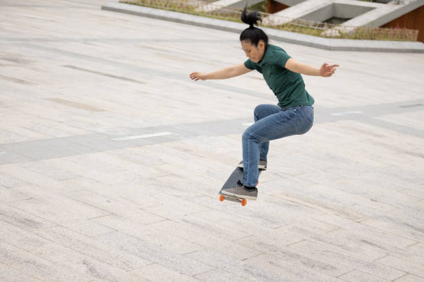 istock Skateboarder skateboarding outdoors in the morning 1311786120