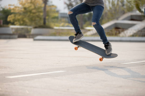 istock Skateboarder skateboarding outdoors in the morning 1311787012