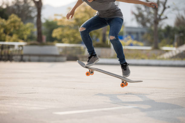 istock Skateboarder skateboarding outdoors in the morning 1311787044