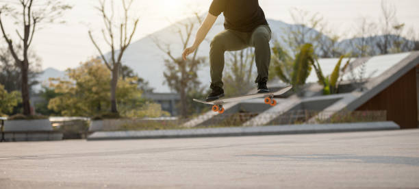 istock Skateboarder skateboarding outdoors in the morning 1311787056