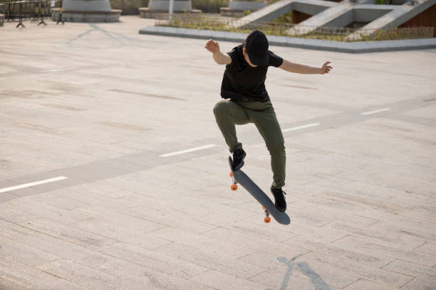 istock Skateboarder skateboarding outdoors in the morning 1311787123
