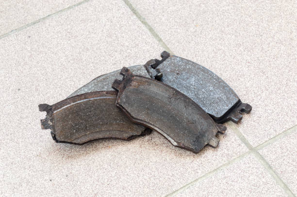istock Old worn out car brake pads. 1311787152
