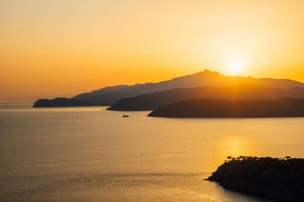 Sunset over Elba Island, Tuscany, Italy. Viewpoint over Innamorata beach.