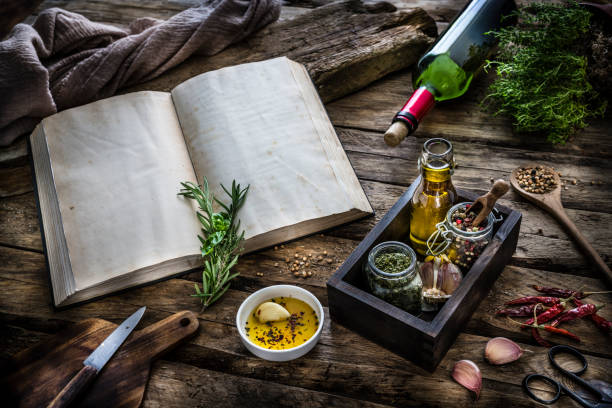 istock Culinary background: recipe book, herbs and spices 1311788868