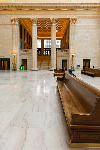 Chicago, Illinois, USA - January 29, 2019: The Great Hall at Chicago's Union Station looking from bench towards grand staircase