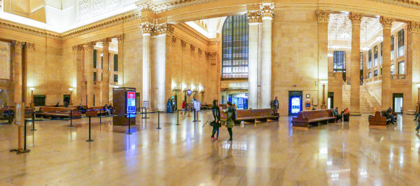 The Great Hall at Chicago's Union Station Chicago, Illinois, USA - February 25, 2020: Wide perspective view of The Great Hall at Chicago's Union Station with passengers, columns, and windows Amtrak stock pictures, royalty-free photos & images