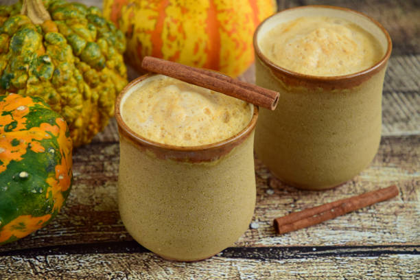 istock Pumpkin spice latte on wooden background 1311796434