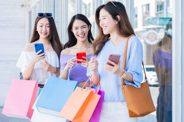 istock women looking content on smartphone 1311797487
