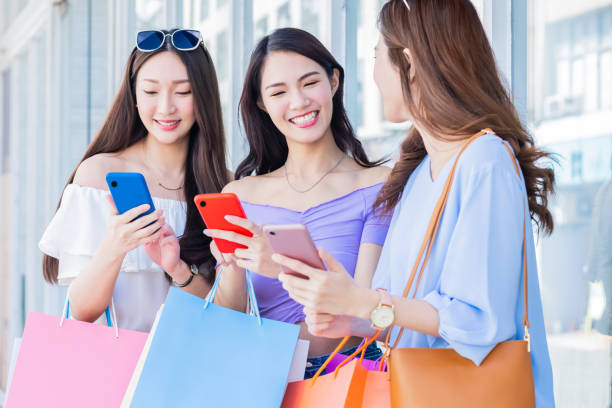 istock women looking content on smartphone 1311797639