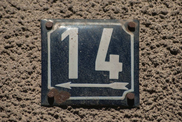 istock Weathered enamelled plate number 14 1311797912