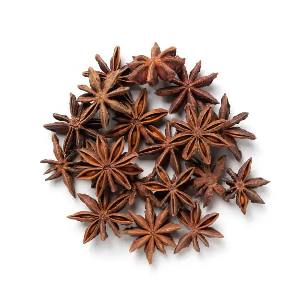 Star Anise – Heap of Chinese Star Aniseed, Aromatic Ingredient – Top View, Close-Up Macro, from Above – Isolated on White Background