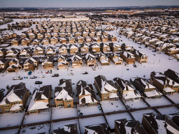 istock Extreme Winter Storm sunrise over suburb homes 1311802151
