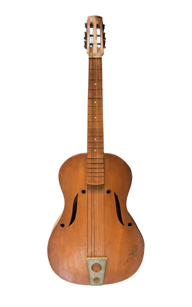 istock Old acoustic guitar isolated 1311802157