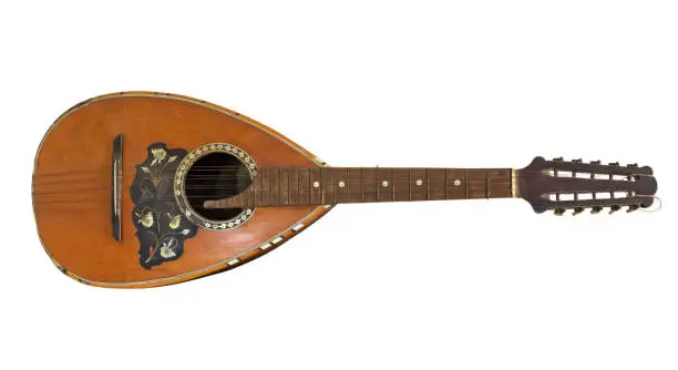 Old mandolin isolated on white background