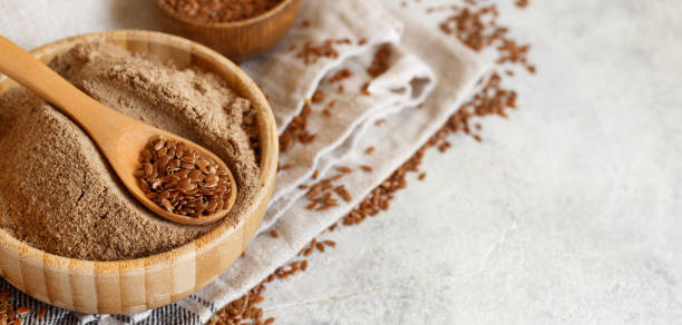istock Raw Flax seeds flour in a bowl with a spoon 1311809228