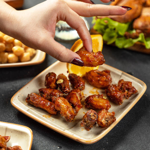 istock Squeezing lemon on the grilled chicken 1311811689