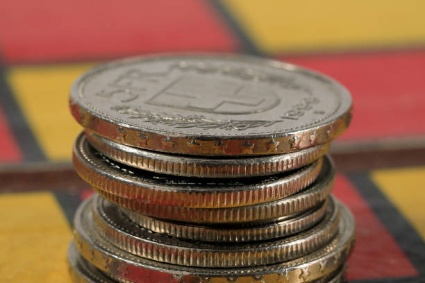 istock A few CHF coins in a pile on the chessboard 1311813134
