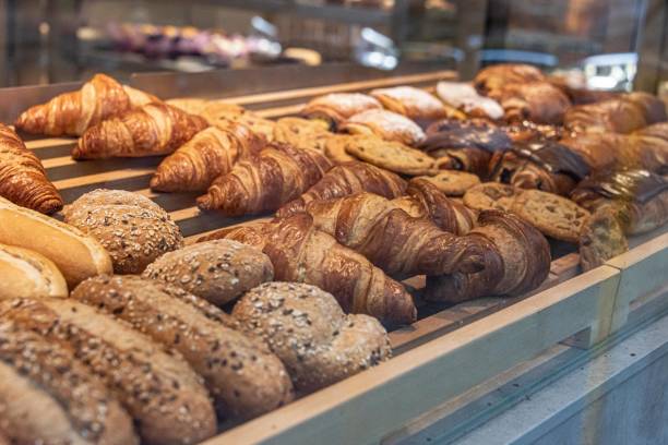 istock Delicious croissants in the bakery 1311818810