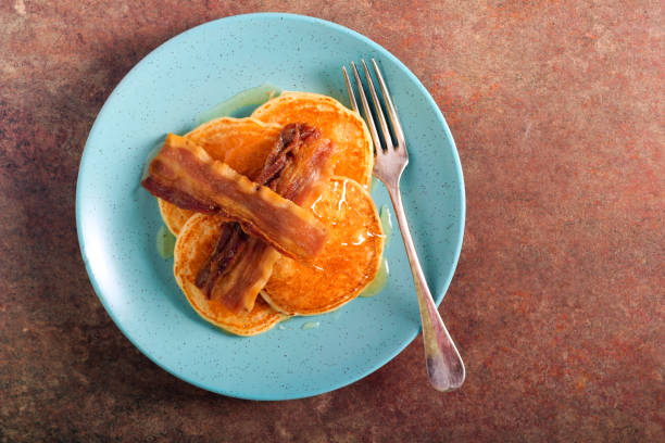 istock pancakes with syrup and bacon 1311822499